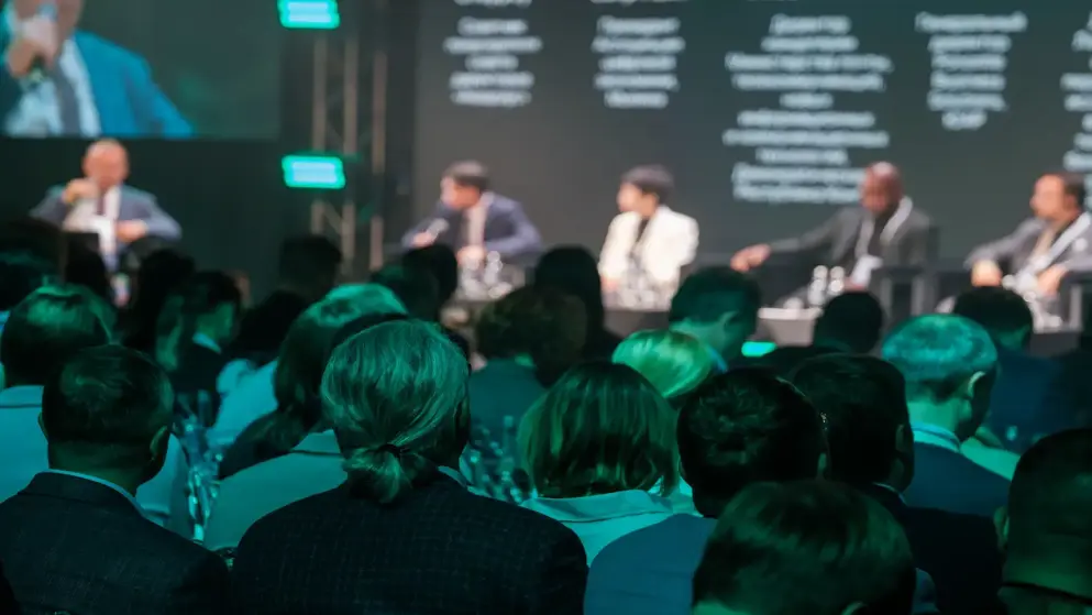 speakers and viewers in a hall